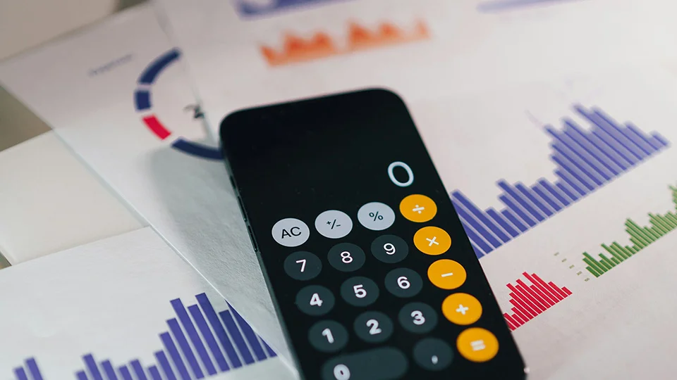 Calculator on top of financial documents