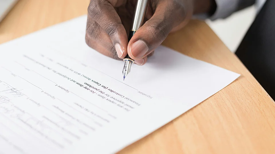 Person signing a document